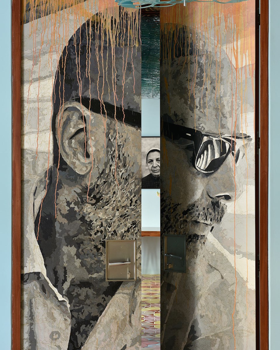 Philippe Pareno's portrait-engraved doors at L'Arlatan.
